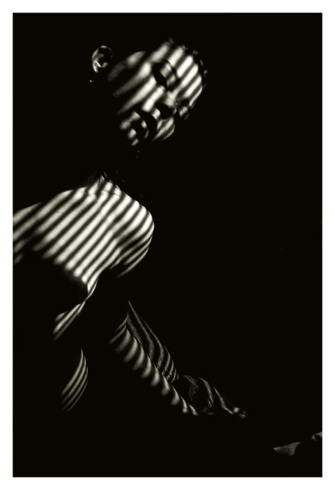 nude woman with shadows