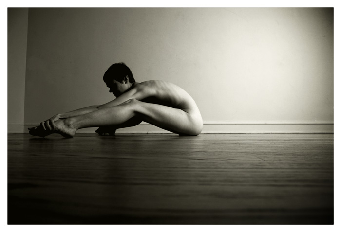 nude sitting on floor