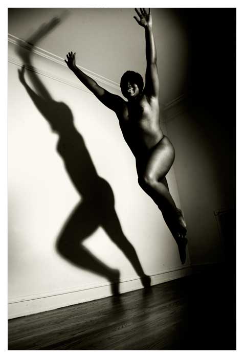 nude African american leaping woman